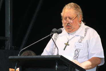 Archdeacon Richard Wallace prays the karakia to open the service, and he prays "in the name of the One who died first."