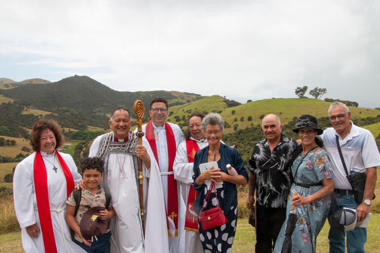 Newly ordained clergy line up with +Kito and whānau