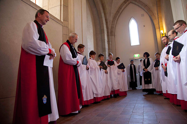 Bishop Ross Bay prays before the ministry team process into St Mary's.