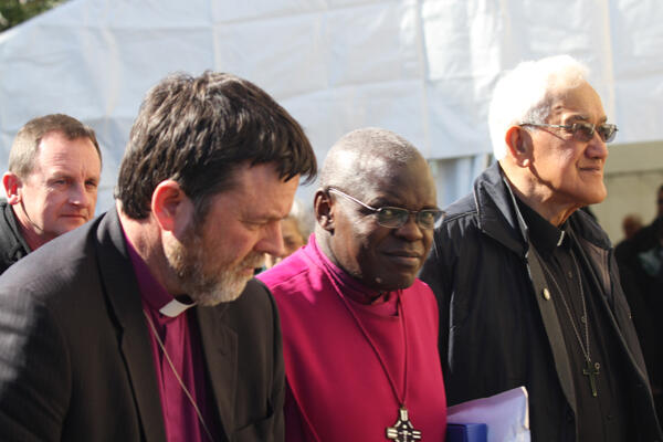 The Archbishop of York is called on to the marae, flanked by Bishop Philip Richardson and Archdeacon Tiki Raumati.