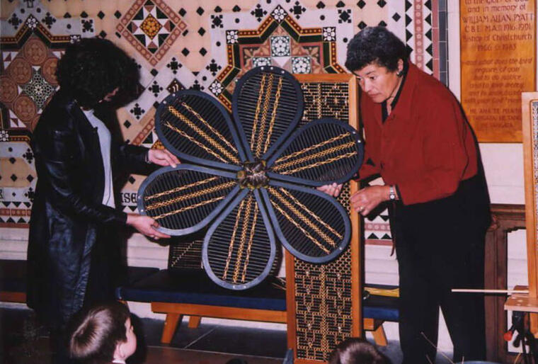 Mae Taurua (right) demonstrates her weaving skills in ChristChurch Cathedral.