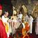 Archbishop John Sentamu seats the Bishop of Taranaki in his new cathedra. Note the white feather trim on Bishop Philip's cope.