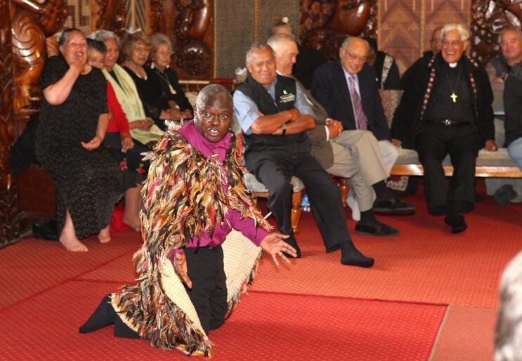 Archbishop Sentamu addressed the folk at Owae Marae on bended knee - but spiced his address with humour.
