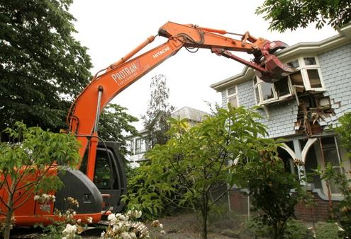Bishop Victoria Matthews' house is levelled by contractors. Photo/The Press
