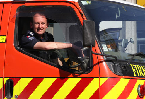 Ross Bay, Bishop of Auckland - in his other life, as Senior Station Officer Bay, helping out in Christchurch. Photo: Lloyd Ashton