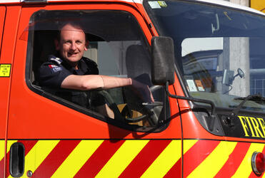 Ross Bay, Bishop of Auckland - in his other life, as Senior Station Officer Bay, helping out in Christchurch. Photo: Lloyd Ashton