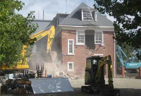 The demolition crew goes to work on the Cathedral Grammar's Statham Building.