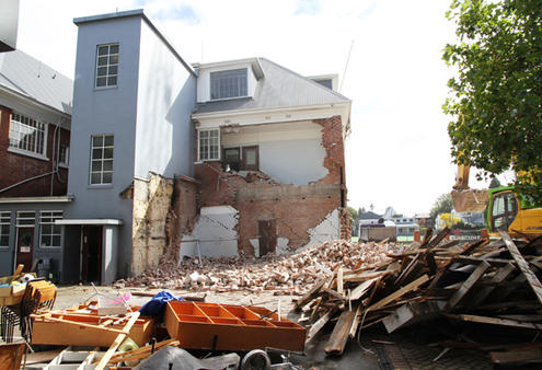 Early phases of the demolition of the Statham building at the Cathedral Grammar School.