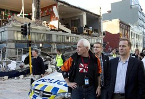 Prime Minister John Key on a damage tour with Mayor Bob Parker. Photo: Reuter
