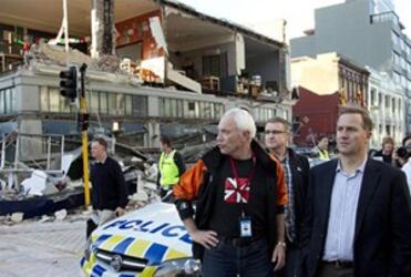 Prime Minister John Key on a damage tour with Mayor Bob Parker. Photo: Reuter