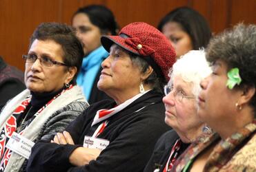 Kamana Katene, Kahu Tapiata, Betsy Gifford and Fa'asega Tapelu consider a presentation.