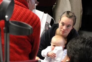 Young Ihaia Simmonds chews over the deeper implications of the hui. That's his mum Hinekura behind him.