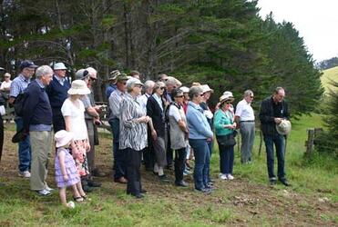  The field-trip party, led by Chris Honore (right), responds with waiata to the welcome from Rihari whanau. 
