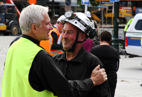 Dean Peter Beck with one of the leaders of the Search and Rescue operation.