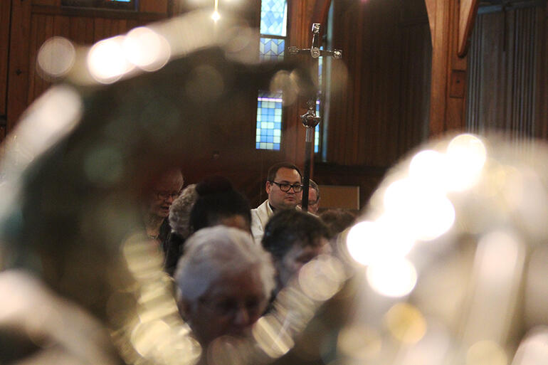 Rev Ivica Gregurec, the Holy Trinity Cathedral Precentor, leads the procession into St Mary's. Rev Ivica Gregurec, the Holy Trinity Cathedral Precentor, leads the procession into St Mary's.