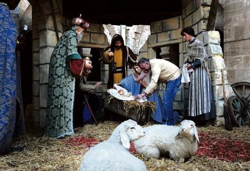 Bethlehem life: a Palestinian man sets up a scene at the Church of the Nativity. Photo/ AP