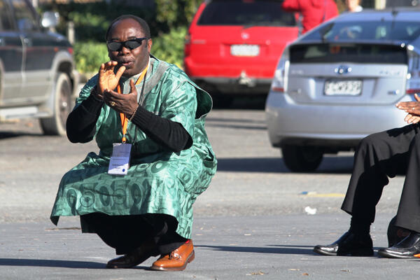 Archbishop Ben Kwashi responds to the powhiri. In Nigeria, he explained, visitors show their respect by kneeling. Archbishop Ben Kwashi responds to the powhiri. In Nigeria, he explained, visitors show their respect by kneeling.