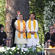 The two Hindu representatives await their turn to pray - while a rabbi looks on.