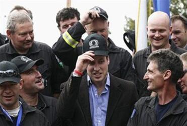 Prince William poses with members of the Urban Search and Rescue team in Christchurch. Photo: Reuters