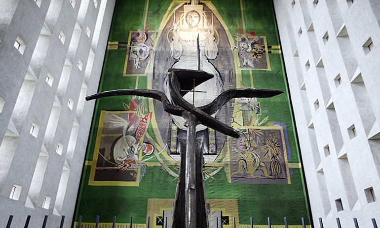 The cross on the high altar in the new Coventry Cathedral. Geoffrey Clarke sculpted the free-form cross around a central cross of nails.