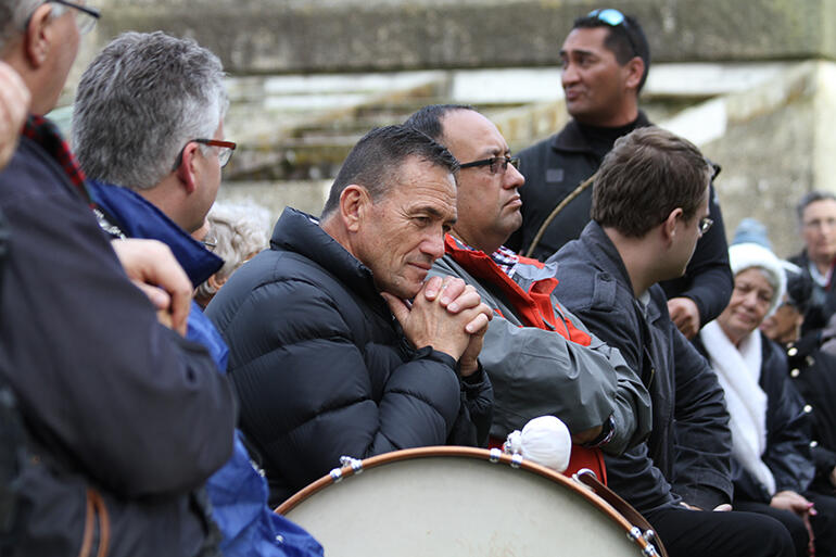 That's former rugby league great and New Plymouth City Councillor Howie Tamati looking pensive over the drum.