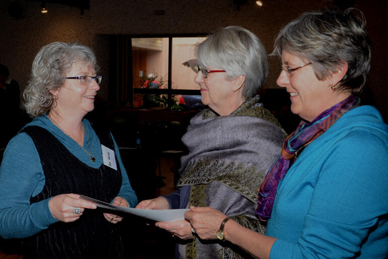 Faith community nurse Ros Vercoe receives her forum training certificate from Elaine Tyrell and Isabel Mordecai in 2014.
