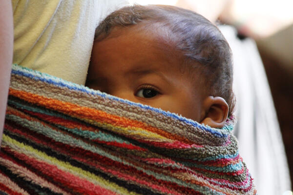 One of the youngest of the Passionfest mob keeps a weather eye on proceedings.