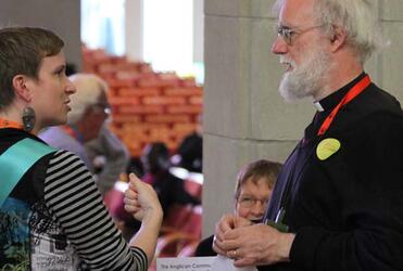 Ms Marion Little (Canada), from the Safe Churches Consultation, discusses progress with the Archbishop of Canterbury.