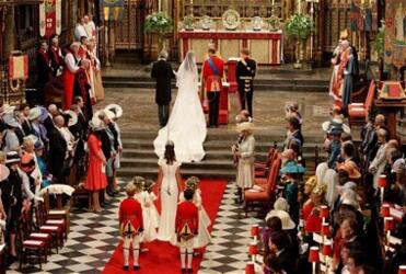 Prince William and Kate Middleton at the high altar of Westminister Abbey.