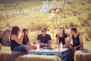 Camping as it should be? Festival-goers sharing good times.
