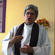 Holy Trinity Vicar Marge Tefft invites people to communion, and to express their grief and hope in symbolic form