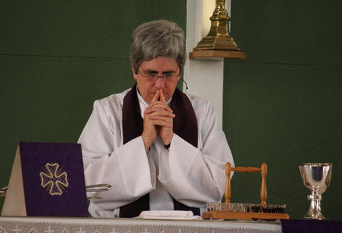 Pausing before she begins to preside: Holy Trinity Greymouth Vicar Marge Tefft. 