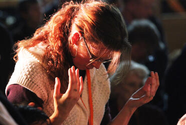 Lost in adoration for her Lord.