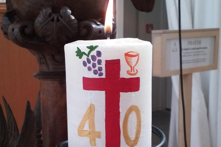 Close-up of a 40th anniversary candle made for the Transitional Cathedral by Elizabeth Kimberley.