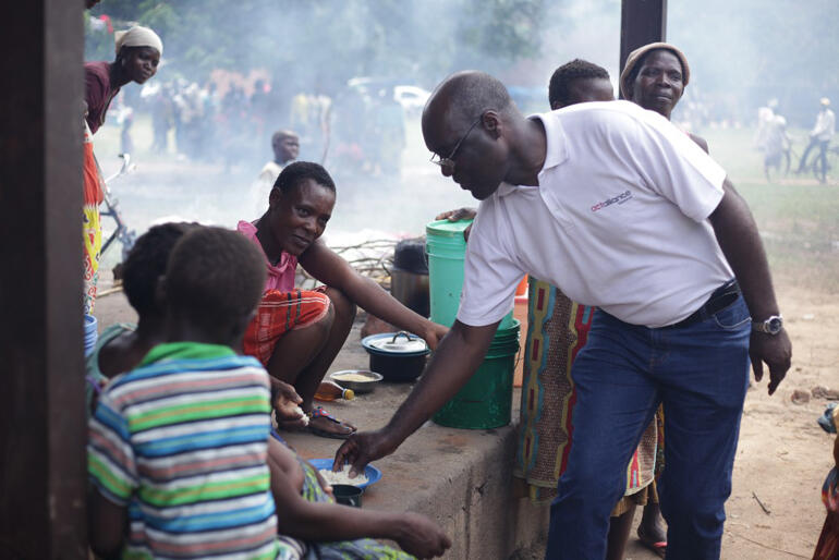 An 'Action of Churches Together' (ACT) Alliance member visits a group of displaced people in Malawi. Photo: ACT Alliance/CWS.