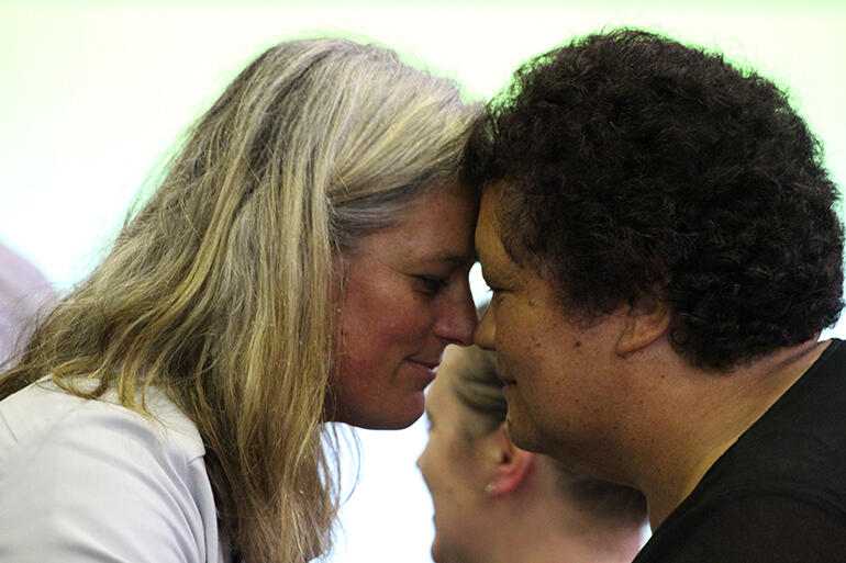 Jax Clark and the Rev Hannah Pomare - who is a Youth Commissioner - exchange hongi. Jax Clark and the Rev Hannah Pomare - who is a Youth Commissioner - exchange hongi.