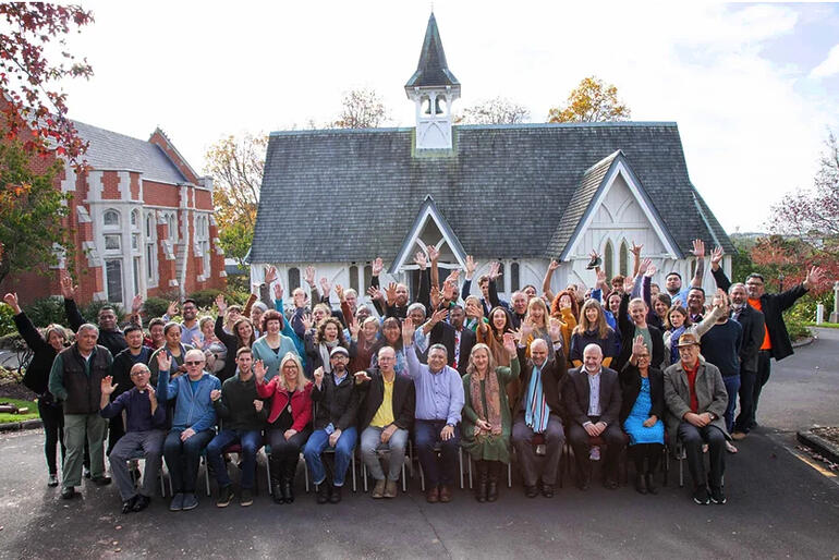 Hoani Tapu students and staff gather in front of St John the Evangelist Theological College chapel.