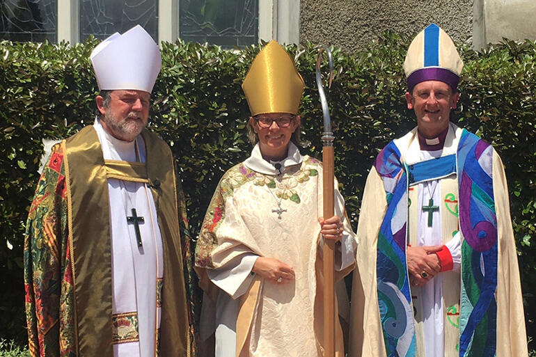 Archbishop Philip, Bishop of Waikato Helen-Ann Hartley - with the returned crozier - and the Bishop of Auckland, Ross Bay.