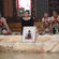A portrait of the late Archbishop Jabez Bryce is flanked by Maori women during the General Synod powhiri.