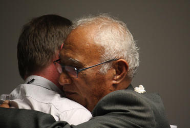 The Rt Rev Ross Bay, the new Bishop of Auckland, greets Bishop Winston on behalf of Tikanga Pakeha.