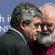 Gordon Brown compares notes with Rowan Williams. Photo: Lewis Whyld/PA