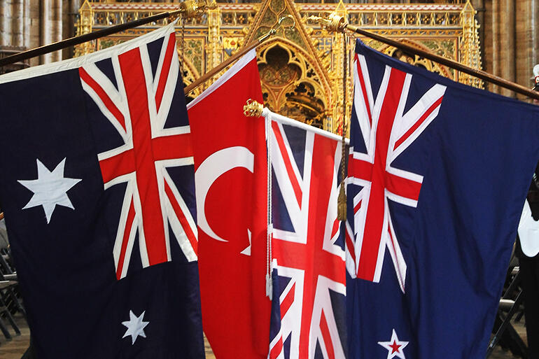 The flags of New Zealand, Turkey, Australia and the United Kingdom dipped in honour of the fallen in Westminster Abbey.