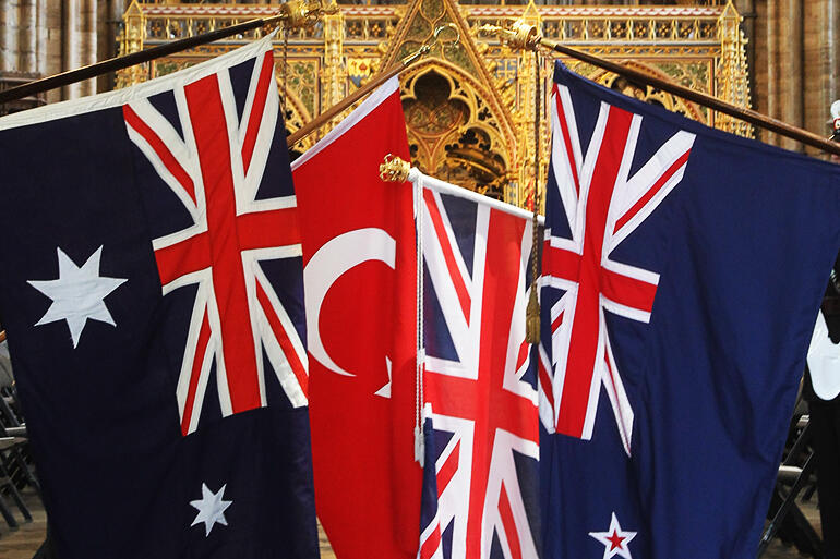 The flags of New Zealand, Turkey, Australia and the United Kingdom dipped in honour of the fallen in Westminster Abbey. The flags of New Zealand, Turkey, Australia and the United Kingdom dipped in honour of the fallen in Westminster Abbey.