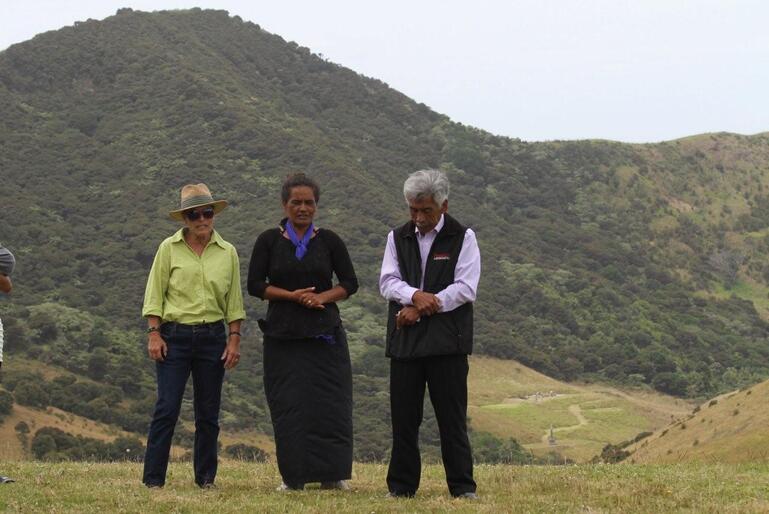 Raewyn Rihari and Raewyn and Hugh's daughter Kiri supply a waiata after Hugh's whaikorero. Note the Marsden Cross in the distance.