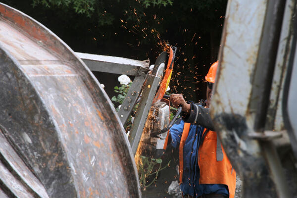 A demolition worker cuts up the fallen bell frame at St Mary's in Merivale. Photo: Lloyd Ashton