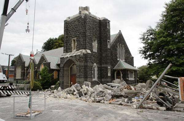 St Mary's in Merivale, minus half its tower. The adjacent brick vicarage is due for complete demolition. Photo: Lloyd Ashton 