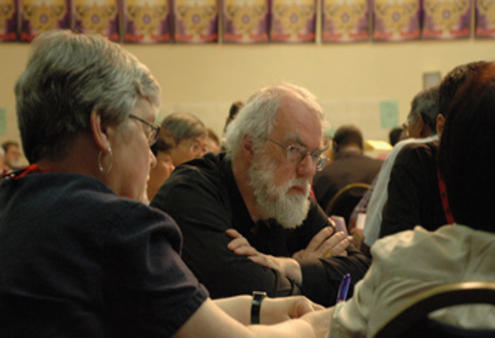 The Archbishop of Canterbury takes part in an ACC discussion group.