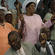 Jamaicans at the ACC's opening Eucharist join hands to sing a call-and-response version of the Lord's Prayer.