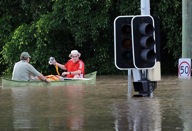 Navigating a flooded street in Brisbane.