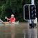 Navigating a flooded street in Brisbane.